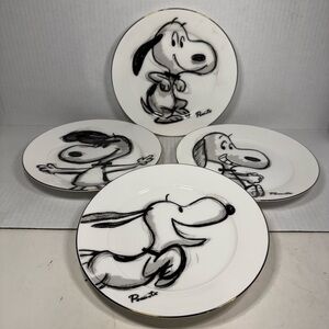 Peanuts Snoopy accent plates from the "Sketchbook" or "Hand-drawn" series